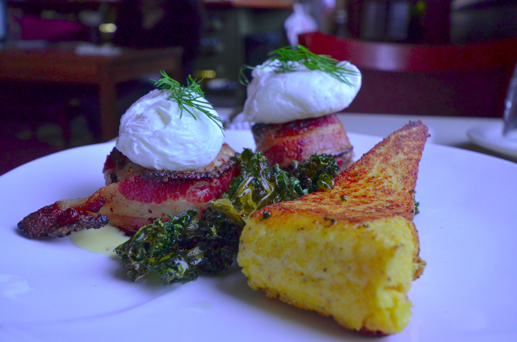 bacon wrapped pork tenderloin with crispy polenta, perfectly poached eggs, and crispy kale
